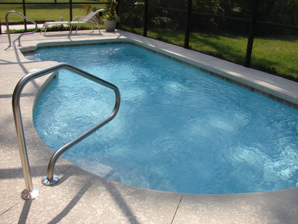 In-ground pool in a warm climate that uses a pool heating system
