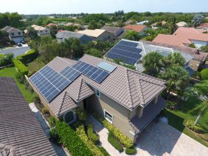 aerial view of a solar pool system's panels mounted on a roof